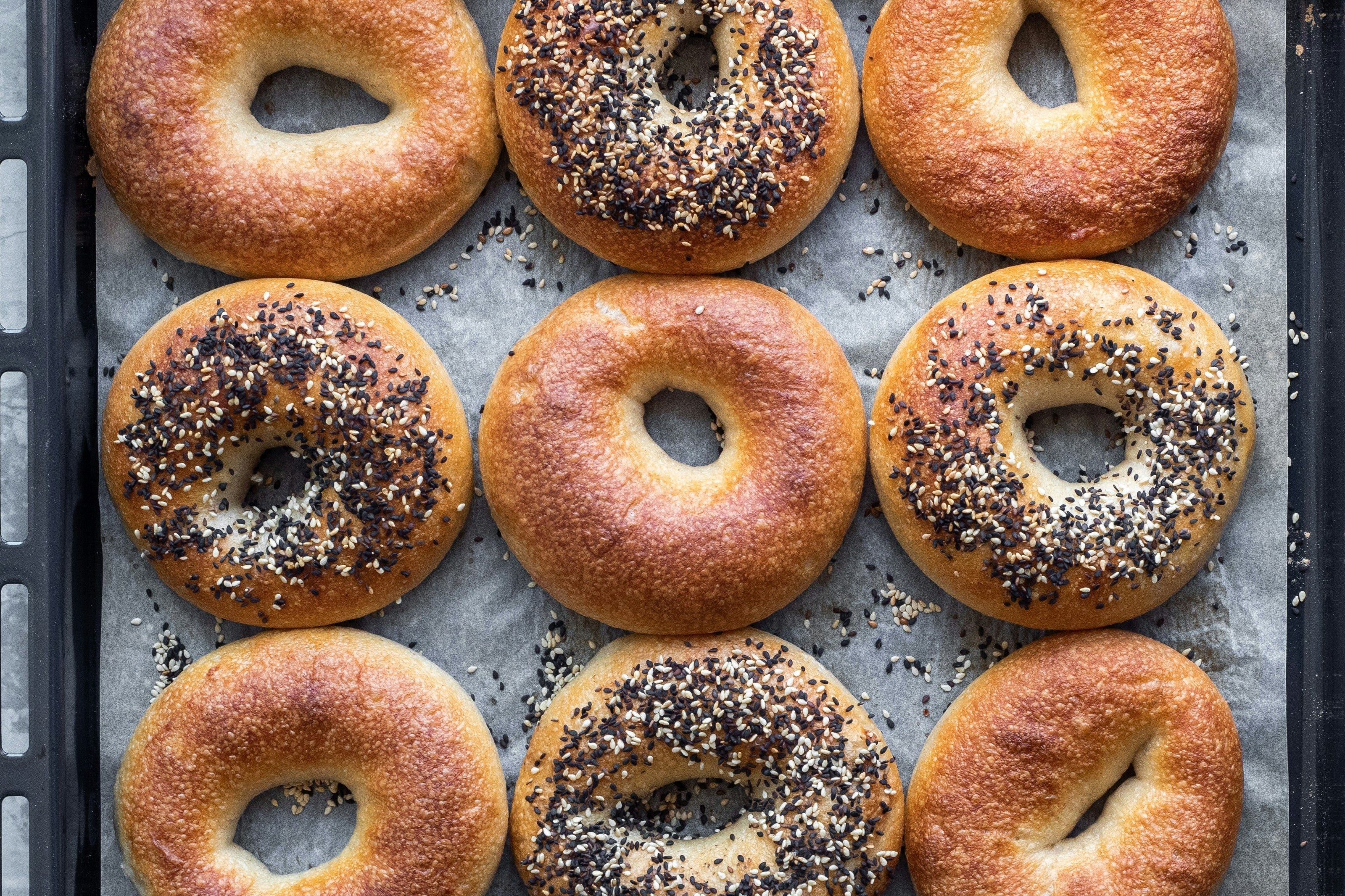 Assortment of Bagels on a Black tray